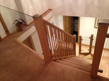Oak open back staircase with ID spindles landing
