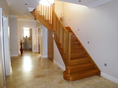 White Oak cut string staircase with chamfered balustrades